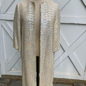 Stunning vintage evening coat. Satin lined. In excellent condition.